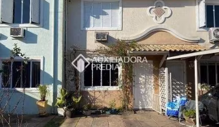 Casa em condomínio fechado com 3 quartos à venda na Avenida Guilherme Schell, 1250, Rio Branco, Canoas, 102 m2 por R$ 335.000