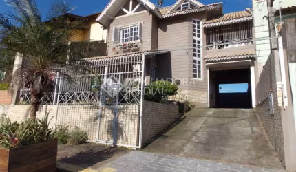 Casa em condomínio fechado com 4 quartos à venda na Avenida Doutor Severo da Silva, 1233, Estância Velha, Canoas, 180 m2 por R$ 1.199.000