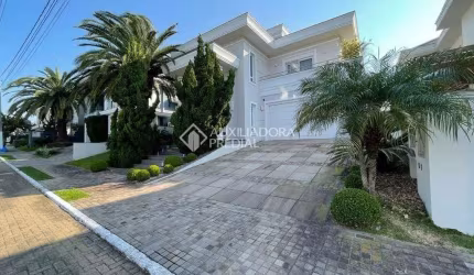 Casa em condomínio fechado com 3 quartos à venda na Avenida Açucena, 50, Estância Velha, Canoas, 400 m2 por R$ 3.100.000