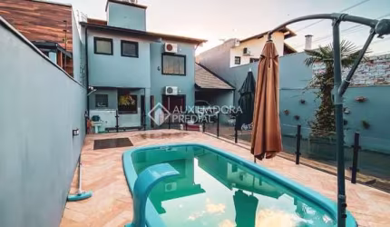 Casa com 3 quartos à venda na Rua João de Azevedo Barbosa Filho, 123, São José, Canoas, 212 m2 por R$ 1.200.000