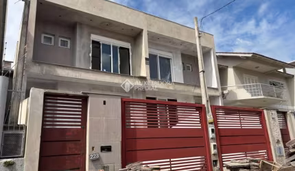 Casa com 3 quartos à venda na Rua Dinamarca, 223, Estância Velha, Canoas, 200 m2 por R$ 1.450.000
