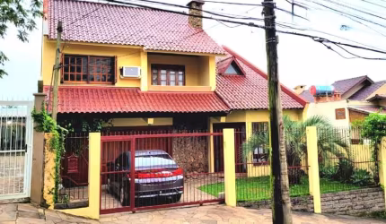 Casa com 3 quartos à venda na Rua Conde de Porto Alegre, 111, Nossa Senhora das Graças, Canoas, 184 m2 por R$ 1.060.000