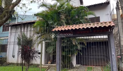 Casa com 4 quartos à venda na Rua São Caetano, 101, Marechal Rondon, Canoas, 360 m2 por R$ 1.000.000