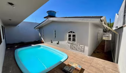 Casa com 4 quartos à venda na Rua das Garças, 278, Harmonia, Canoas, 87 m2 por R$ 448.000