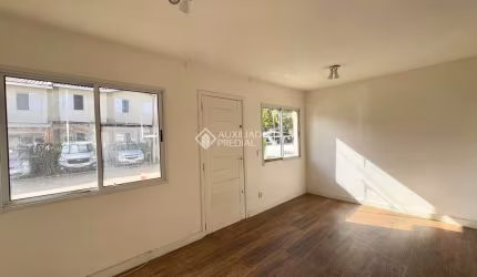 Casa em condomínio fechado com 3 quartos à venda na Rua dos Guaramirins, 303, Igara, Canoas, 107 m2 por R$ 360.000