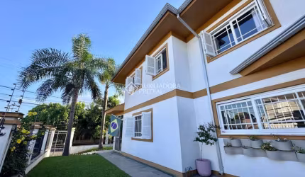 Casa com 3 quartos à venda na Rua Suíça, 270, Marechal Rondon, Canoas, 200 m2 por R$ 1.650.000