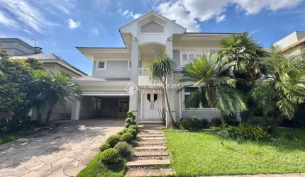 Casa em condomínio fechado com 3 quartos à venda na Rua Monte Castelo, 2007, Marechal Rondon, Canoas, 430 m2 por R$ 2.890.000