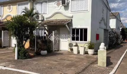 Casa em condomínio fechado com 2 quartos à venda na Avenida Guilherme Schell, 1250, Rio Branco, Canoas, 76 m2 por R$ 250.000
