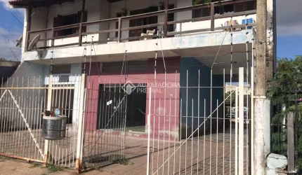 Casa com 3 quartos à venda na Rua Fernando Ferrari, 2688, Niterói, Canoas, 440 m2 por R$ 690.000