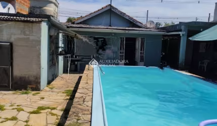 Casa em condomínio fechado com 3 quartos à venda na Rua Boqueirão, 1734, Estância Velha, Canoas, 119 m2 por R$ 1.063.900