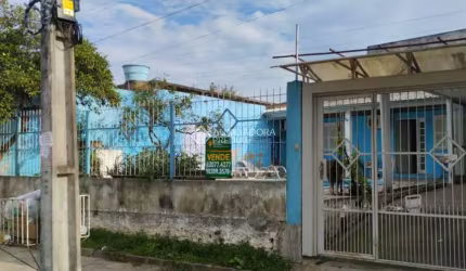 Casa com 3 quartos à venda na D CINCO, 19, Guajuviras, Canoas, 72 m2 por R$ 372.000