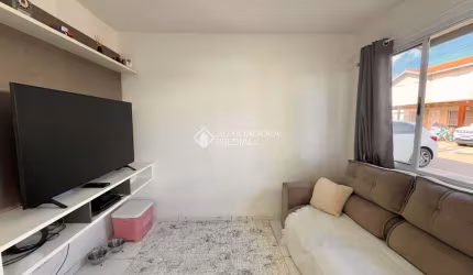 Casa em condomínio fechado com 3 quartos à venda na Rua dos Guaramirins, 303, Igara, Canoas, 110 m2 por R$ 380.000