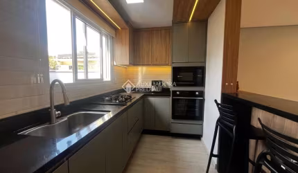 Casa em condomínio fechado com 3 quartos à venda na Rua Doutor Tancredo Neves, 160, Fátima, Canoas, 92 m2 por R$ 488.000