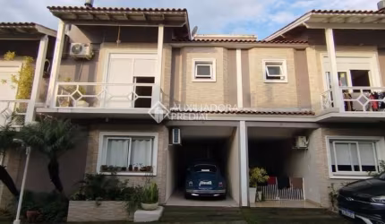 Casa em condomínio fechado com 3 quartos à venda na Rua Tenente Antônio João, 845, Nossa Senhora das Graças, Canoas, 151 m2 por R$ 788.000