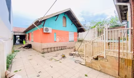 Casa em condomínio fechado com 4 quartos à venda na Rua Saldanha da Gama, 426, Harmonia, Canoas, 230 m2 por R$ 289.000