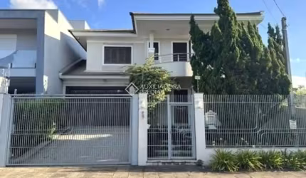 Casa com 3 quartos à venda na Rua País de Gales, 627, Marechal Rondon, Canoas, 196 m2 por R$ 1.350.000