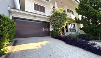 Casa com 3 quartos à venda na Rua País de Gales, 627, Marechal Rondon, Canoas, 196 m2 por R$ 1.350.000