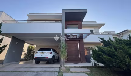 Casa em condomínio fechado com 3 quartos à venda na Avenida Açucena, 50, Estância Velha, Canoas, 340 m2 por R$ 2.950.000