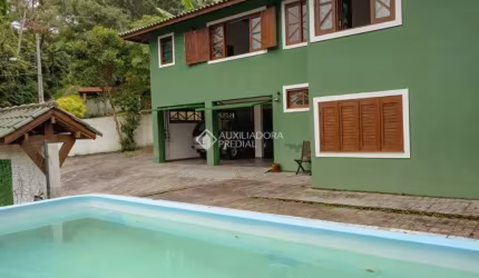 Casa com 4 quartos à venda na Servidão Recanto da Pedra, 3, Rio Tavares, Florianópolis, 396 m2 por R$ 1.900.000