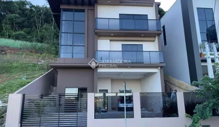 Casa em condomínio fechado com 5 quartos à venda na Rodovia SC-281, 12, Sertão do Maruim, São José, 330 m2 por R$ 2.300.000
