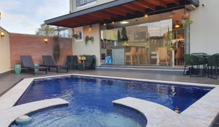 Casa à venda Condomínio Pitangueiras, 4 suítes, área gourmet