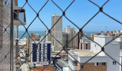Apartamento vista mar de 63m² com 2 quartos, 1 suíte, 1 vaga, varanda gourmet e lazer completo