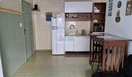 Kitnet à venda com 40m², 1 quarto, 1 banheiro e 1 vaga no bairro Tupi em Praia Grande frente ao mar