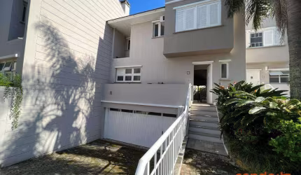 Casa com 3 dormitórios para alugar, 205 m² por R$ 10.535,01/mês - Pedra Redonda - Porto Alegre/RS