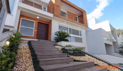 Casa com 3 dormitórios para alugar, 260 m² por R$ 9.079,56/mês - Aberta dos Morros - Porto Alegre/RS