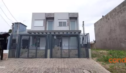 Casa com 3 dormitórios para alugar, 125 m² por R$ 2.870,00/mês - Guarujá - Porto Alegre/RS