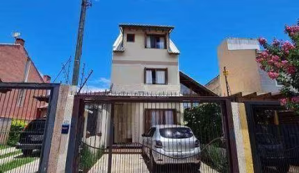 Casa com 3 dormitórios para alugar, 182 m² por R$ 6.721,00/mês - Espírito Santo - Porto Alegre/RS