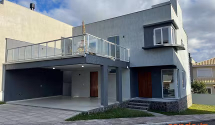 Sobrado com 3 dormitórios para alugar, 226 m² por R$ 6.950,00/mês - Aberta dos Morros - Porto Alegre/RS