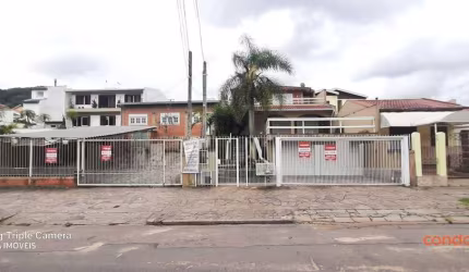 Casa com 3 dormitórios para alugar, 222 m² por R$ 3.199,48/mês - Hípica - Porto Alegre/RS
