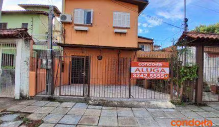 Casa com 3 dormitórios para alugar, 60 m² por R$ 1.440,00/mês - Vila Nova - Porto Alegre/RS