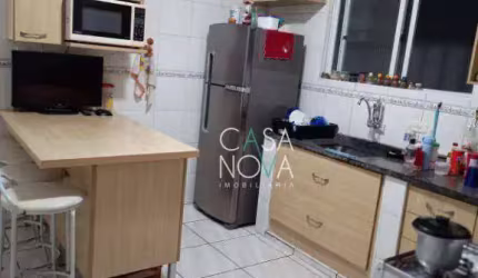 Casa com 3 dormitórios à venda, 100 m² por R$ 630.000,00 - Estuário - Santos/SP