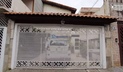 Sobrado com edícula e churrasqueira
