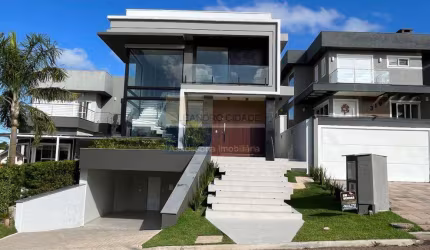 Casa de condomínio 4 dormitórios à venda no Bairro Condomínio Buena Vista com 335 m² de área privativa - 2 vagas de garagem