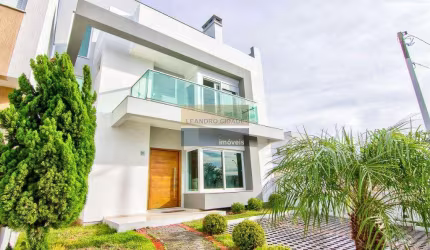 Casa de condomínio 3 dormitórios à venda no Bairro Mário Quintana com 282 m² de área privativa - 2 vagas de garagem