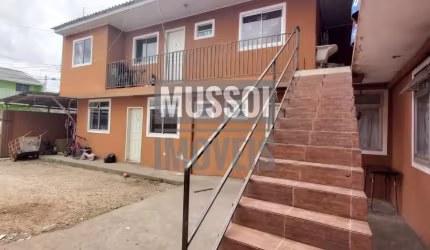 Terreno com 4 apartamentos no Sitio Cercado