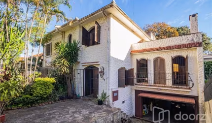 Casa com 5 quartos à venda na Rua Professor Ivo Corseuil, 129, Petrópolis, Porto Alegre, 400 m2 por R$ 1.350.000