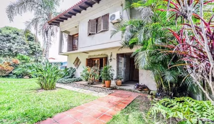 Casa em condomínio fechado com 4 quartos à venda na Acesso das Orquídeas, 93, Santa Tereza, Porto Alegre, 231 m2 por R$ 520.000