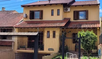 Casa com 3 quartos à venda na Rua Doutor Mário Totta, 2812, Tristeza, Porto Alegre, 287 m2 por R$ 870.000