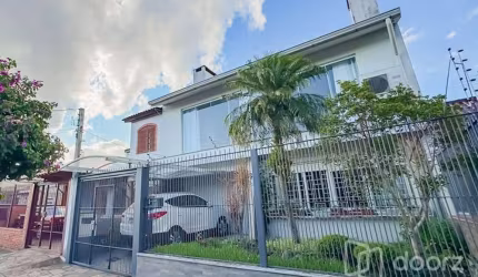 Casa com 4 quartos à venda na Rua Pedro Waine, 194, Santa Maria Goretti, Porto Alegre, 233 m2 por R$ 835.000