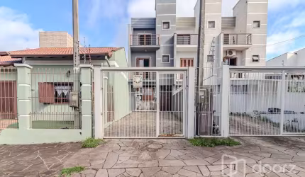 Casa com 3 quartos à venda na Rua Hugo Nelson Magalhães, 141, Rubem Berta, Porto Alegre, 156 m2 por R$ 429.000