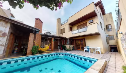 Casa com 4 quartos à venda na Rua Pinto da Rocha, 383, Partenon, Porto Alegre, 420 m2 por R$ 890.000