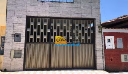 Sobrado com 3 dormitórios à venda, 120 m² por R$ 399.000,00 - Tude Bastos (Sítio do Campo) - Praia Grande/SP