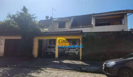 Sobrado com 4 dormitórios à venda, 211 m² por R$ 820.000,00 - Aviação - Praia Grande/SP