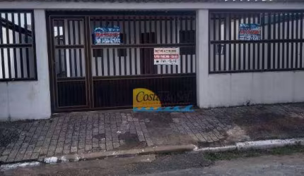 Casa com 3 dormitórios à venda, 140 m² por R$ 550.000,00 - Caiçara - Praia Grande/SP
