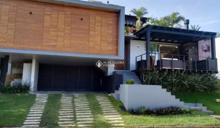 Casa em condomínio fechado com 3 quartos à venda na DAS FLORES, 19, Morrinhos, Garopaba, 388 m2 por R$ 2.980.000