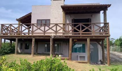 Casa com 5 quartos à venda na Porto Novo, 765, Praia do Rosa, Imbituba, 144 m2 por R$ 695.000